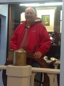 Paul takes the pilots wheel at the Southport Maritime Museum