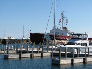 Ice Breaker Mackinaw berthed at a Sheppler dock adjacent to the two marinas.